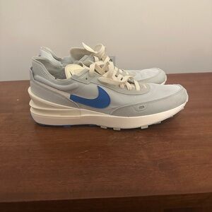 Nike Light Gray Sneakers with Blue Swoosh